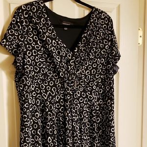 Leopard print dress with wooden detail
